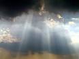 dark clouds with light streaming down